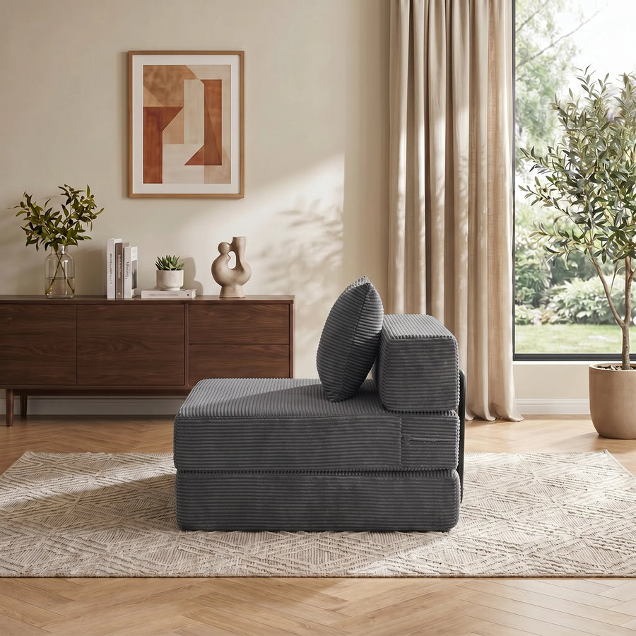 Modulares 1-Sitzer-Sofa aus Cord, dunkelgrau, Seitenansicht mit Zierkissen