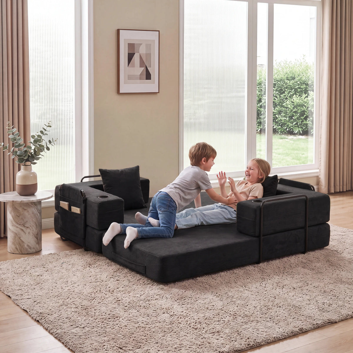 Schwarzes modulares 2-Sitzer Sofa mit seitlichen Würfelmodulen und Kissen