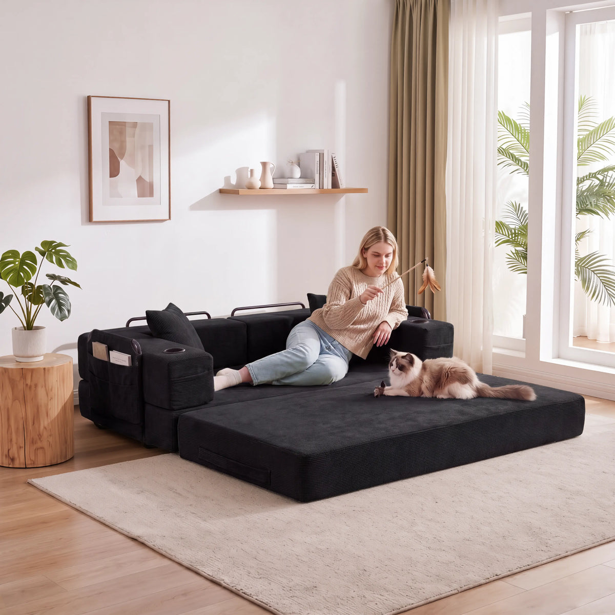 Schwarzes modulares 2-Sitzer Sofa mit langer Sitzfläche und Rücken- sowie Seitenkissen