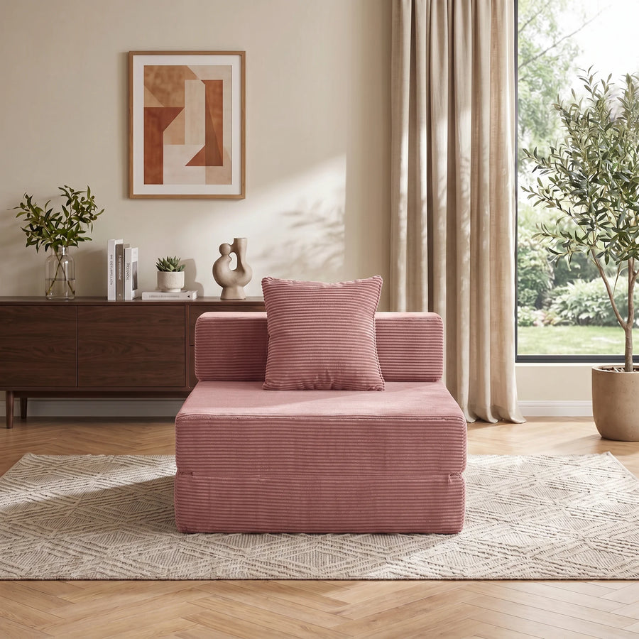 1-Sitzer-Cordsofa in Rosa mit zwei gestuften Sitzteilen und Zierkissen.